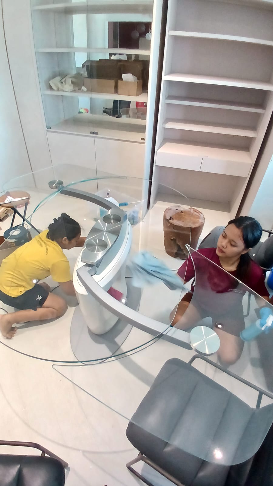 Avalon home cleaning team professionally wiping and sanitizing furniture in Singapore